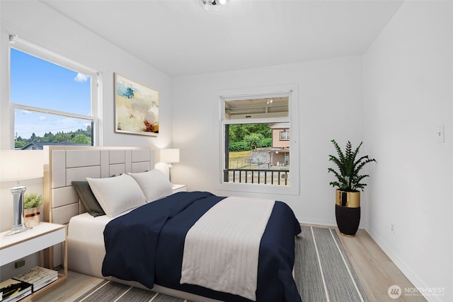 2104 Stuart St, Raymond, WA 98577 - bedroom with wood finished floors and baseboards