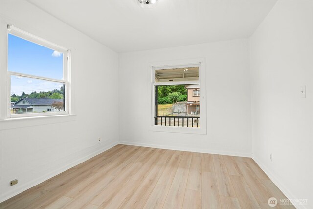 2104 Stuart St, Raymond, WA 98577 - empty room with wood finished floors