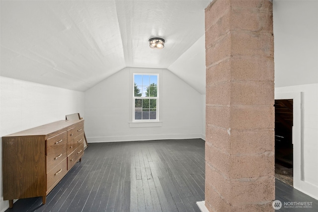 2104 Stuart St, Raymond, WA 98577 - additional living space with dark wood-style flooring and vaulted ceiling