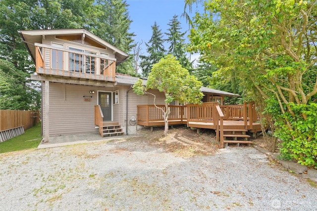 383 E Piper Way, Camano Island, WA 98282 - rear view of house featuring a wooden deck and entry steps