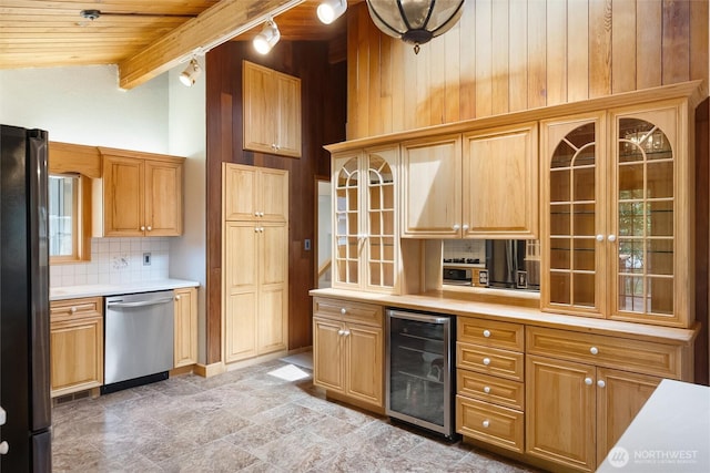 383 E Piper Way, Camano Island, WA 98282 - kitchen featuring beverage cooler, stainless steel appliances, rail lighting, a wooden ceiling with exposed beams, and light countertops