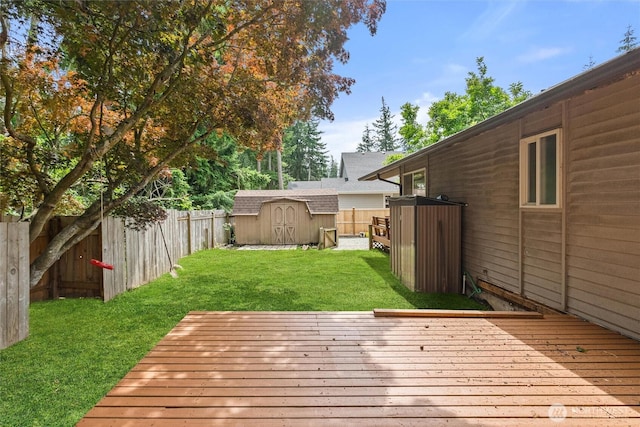 383 E Piper Way, Camano Island, WA 98282 - wooden deck with a storage unit and a fenced backyard