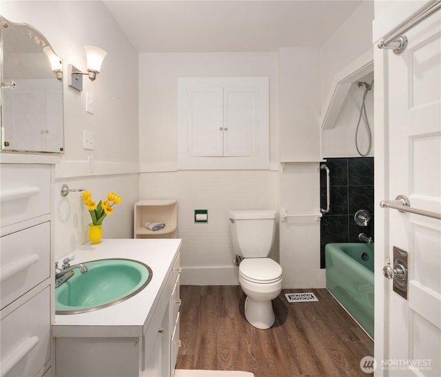 32112 E Bird St, Carnation, WA 98014 - full bath featuring wood finished floors, vanity, and tub / shower combination