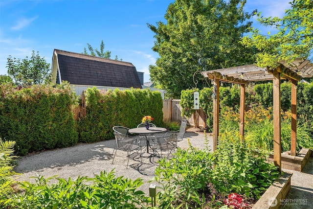 32112 E Bird St, Carnation, WA 98014 - view of patio with a pergola, a storage shed, and outdoor dining area