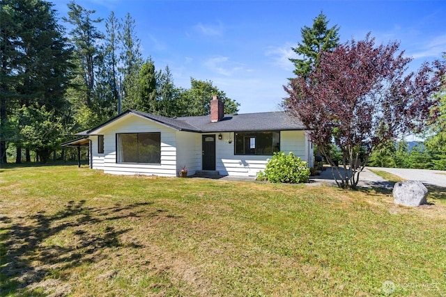 1173 Grauel Ramapo Rd, Port Angeles, WA 98363 - single story home with a chimney and a front lawn