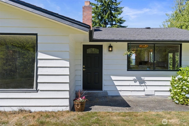 1173 Grauel Ramapo Rd, Port Angeles, WA 98363 - property entrance with a chimney