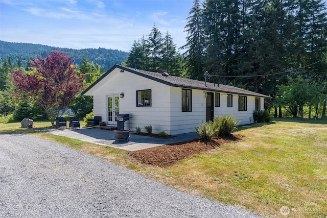 1173 Grauel Ramapo Rd, Port Angeles, WA 98363 - view of front of property featuring french doors and a front yard