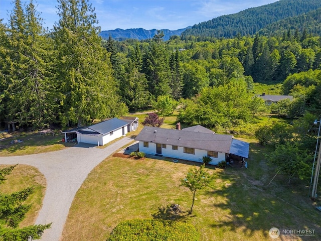 1173 Grauel Ramapo Rd, Port Angeles, WA 98363 - view from above of property featuring a heavily wooded area and a mountain backdrop