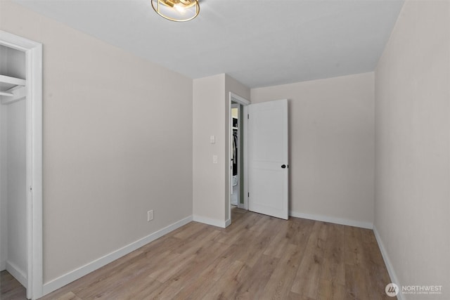 1173 Grauel Ramapo Rd, Port Angeles, WA 98363 - unfurnished bedroom featuring light wood-type flooring and baseboards