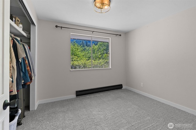 1173 Grauel Ramapo Rd, Port Angeles, WA 98363 - unfurnished room featuring a baseboard heating unit and carpet
