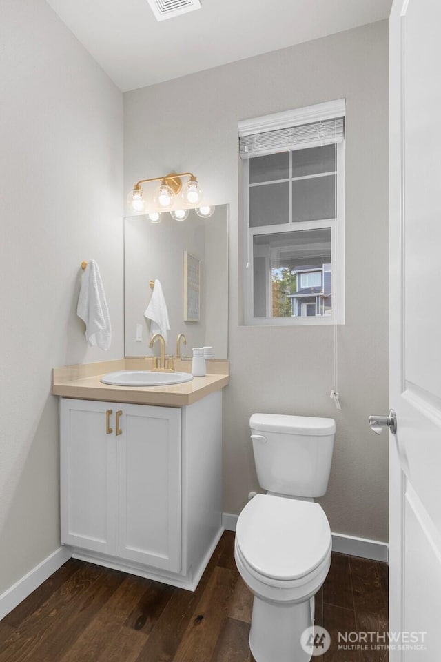 19042 123rd Ave SE, Renton, WA 98058 - bathroom with vanity and wood finished floors