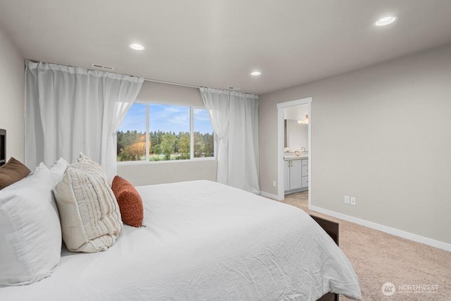 19042 123rd Ave SE, Renton, WA 98058 - bedroom featuring recessed lighting, light carpet, and connected bathroom