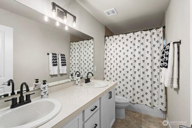 19042 123rd Ave SE, Renton, WA 98058 - bathroom with toilet and double vanity