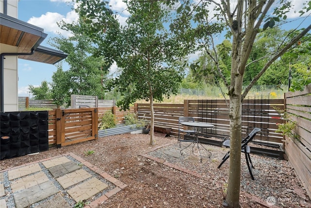 4214 S Trenton St, Seattle, WA 98118 - fenced backyard with a patio