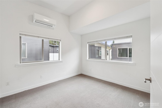 4214 S Trenton St, Seattle, WA 98118 - carpeted empty room with an AC wall unit and baseboards