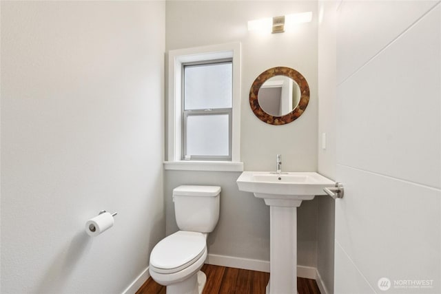 4214 S Trenton St, Seattle, WA 98118 - bathroom featuring baseboards and wood finished floors