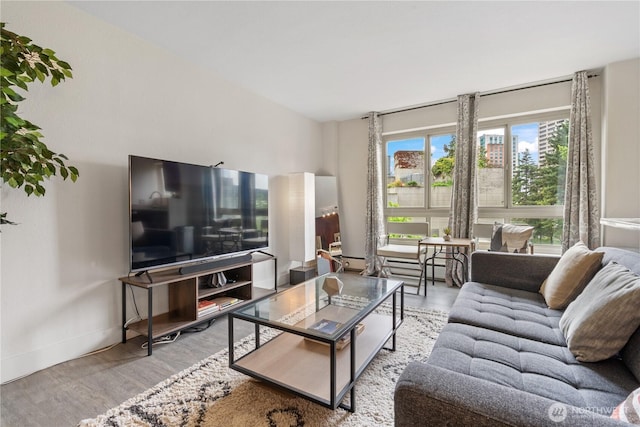1400 Hubbell Pl Unit 909, Seattle, WA 98101 - living area with wood finished floors and baseboards