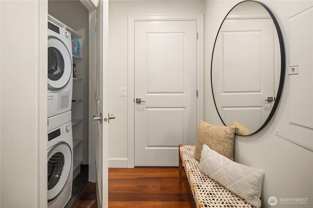 1920 4th Ave Unit 1105, Seattle, WA 98101 - laundry room featuring stacked washer and clothes dryer and dark wood-type flooring