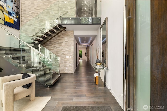 11210 SE 74th St, Newcastle, WA 98056 - entrance foyer with wood finished floors, stairs, and a towering ceiling