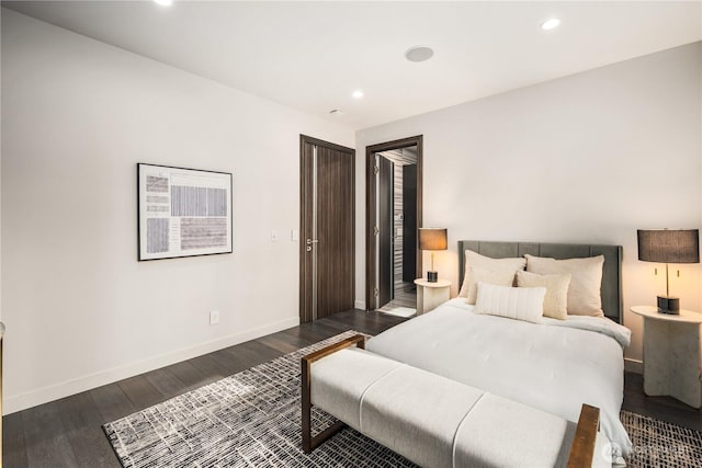 11210 SE 74th St, Newcastle, WA 98056 - bedroom with dark wood finished floors and recessed lighting