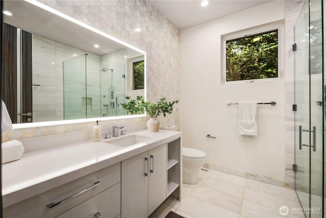 11210 SE 74th St, Newcastle, WA 98056 - bathroom featuring vanity, a shower stall, healthy amount of natural light, and recessed lighting