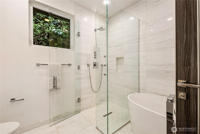 11210 SE 74th St, Newcastle, WA 98056 - full bath with a freestanding tub, a shower stall, and tile patterned flooring