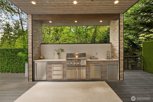 11210 SE 74th St, Newcastle, WA 98056 - wooden terrace with exterior kitchen and a sink