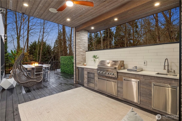 11210 SE 74th St, Newcastle, WA 98056 - deck with an outdoor fire pit, area for grilling, and a ceiling fan