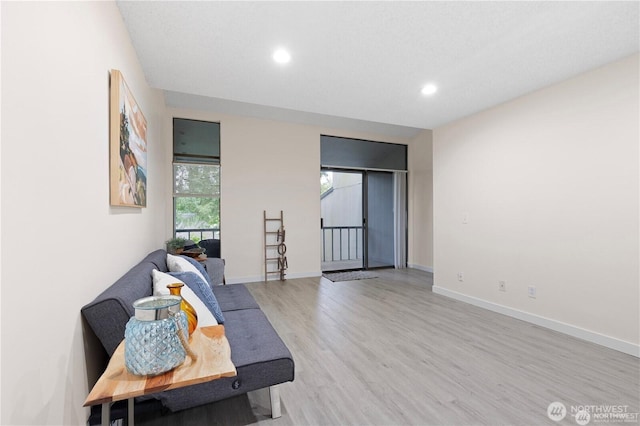 13838 NE 60th St Unit 165, Redmond, WA 98052 - living area featuring wood finished floors and recessed lighting
