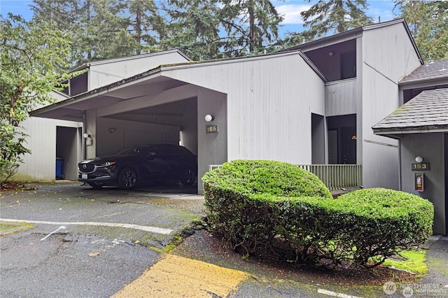 13838 NE 60th St Unit 165, Redmond, WA 98052 - view of property exterior featuring an attached carport