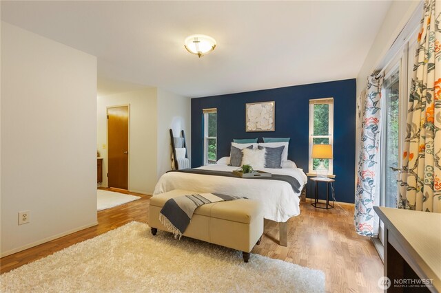 26639 NE Stewart St, Duvall, WA 98019 - bedroom featuring wood finished floors and baseboards