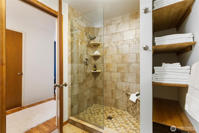 26639 NE Stewart St, Duvall, WA 98019 - bathroom with a walk in shower and wood finished floors
