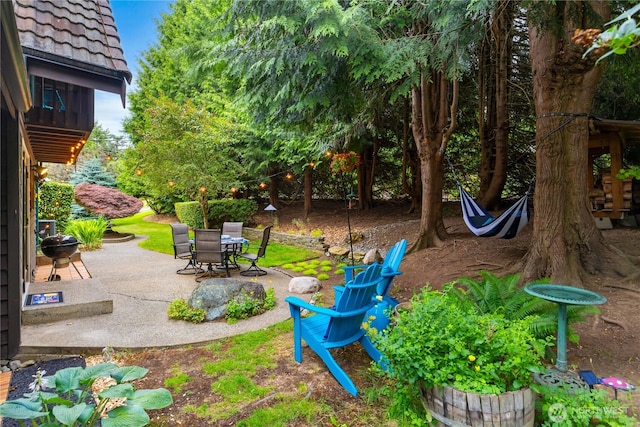 26639 NE Stewart St, Duvall, WA 98019 - view of yard featuring a patio and outdoor dining area