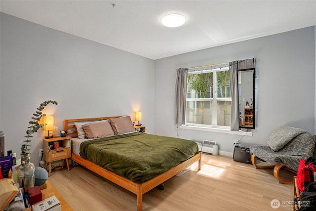 3221 SW Avalon Way Unit 113, Seattle, WA 98126 - bedroom with wood finished floors and baseboards