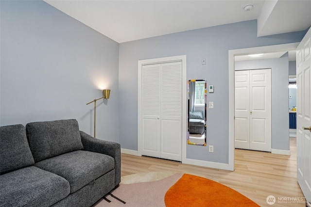3221 SW Avalon Way Unit 113, Seattle, WA 98126 - living area featuring light wood finished floors and baseboards
