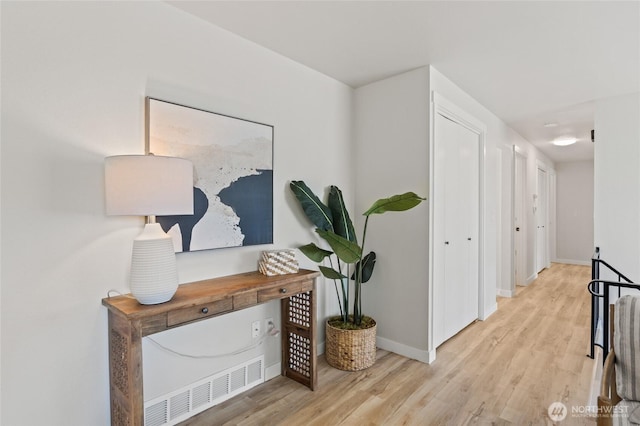 13726 SE 24th St, Bellevue, WA 98005 - hallway featuring wood finished floors and baseboards