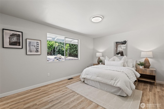 13726 SE 24th St, Bellevue, WA 98005 - bedroom featuring baseboards and light wood-style floors
