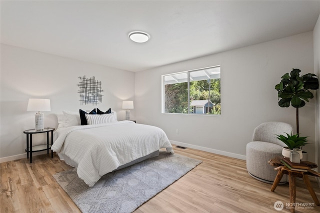 13726 SE 24th St, Bellevue, WA 98005 - bedroom with baseboards and light wood finished floors