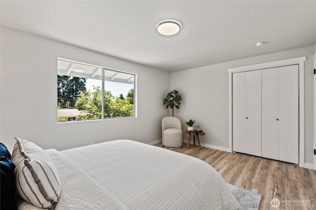 13726 SE 24th St, Bellevue, WA 98005 - bedroom with baseboards and wood finished floors