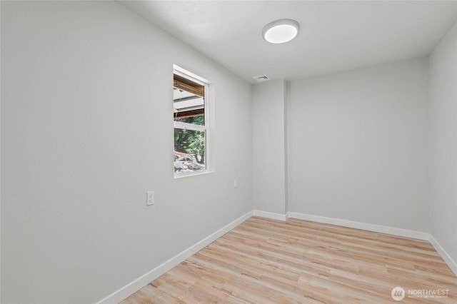 13726 SE 24th St, Bellevue, WA 98005 - spare room featuring light wood-style floors and baseboards
