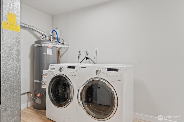 13726 SE 24th St, Bellevue, WA 98005 - laundry area featuring water heater, separate washer and dryer, and light wood-style flooring