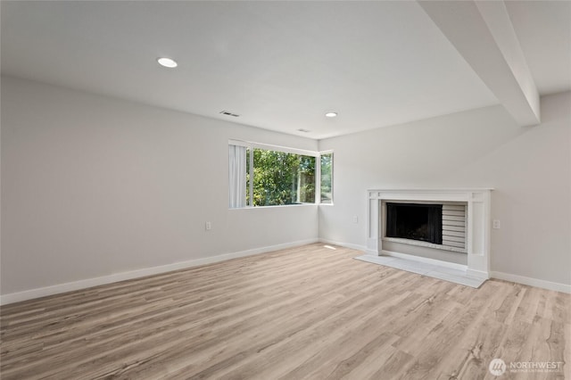 13726 SE 24th St, Bellevue, WA 98005 - unfurnished living room featuring light wood-type flooring, a fireplace with flush hearth, and recessed lighting