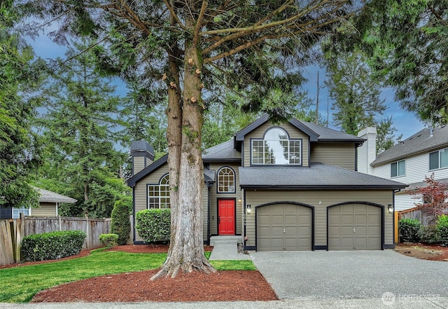 5044 157th Ct NE, Redmond, WA 98052 - view of front of home with concrete driveway, a chimney, a shingled roof, and an attached garage