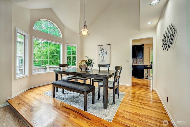 5044 157th Ct NE, Redmond, WA 98052 - dining area with light wood-type flooring, recessed lighting, and high vaulted ceiling