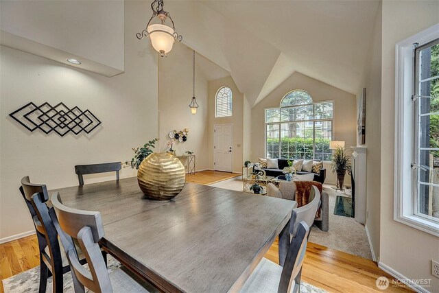 5044 157th Ct NE, Redmond, WA 98052 - dining area featuring light wood finished floors and high vaulted ceiling