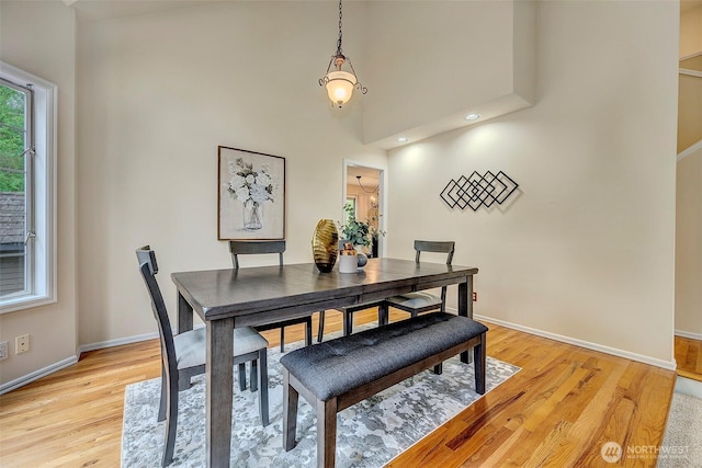 5044 157th Ct NE, Redmond, WA 98052 - dining area featuring light wood finished floors and a towering ceiling
