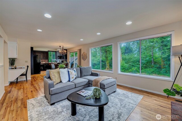 5044 157th Ct NE, Redmond, WA 98052 - living area with a chandelier, light wood-style floors, and recessed lighting
