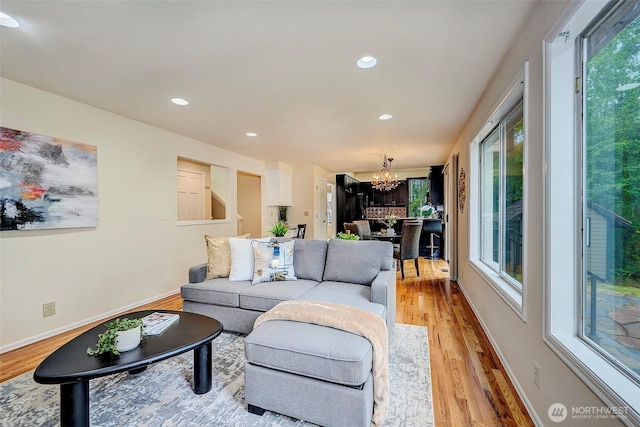 5044 157th Ct NE, Redmond, WA 98052 - living area with a chandelier, light wood-style flooring, and recessed lighting