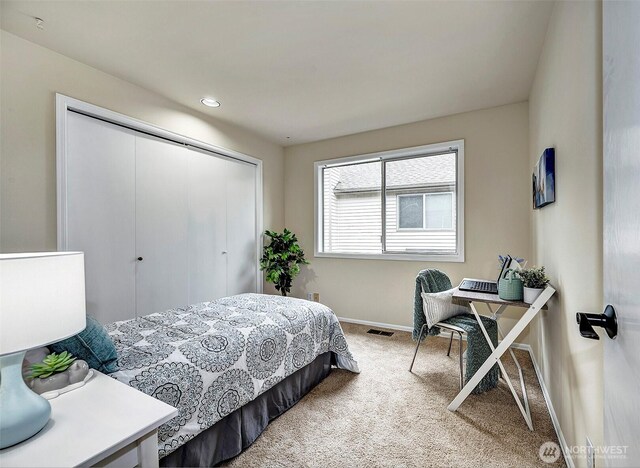 5044 157th Ct NE, Redmond, WA 98052 - carpeted bedroom with baseboards and a closet