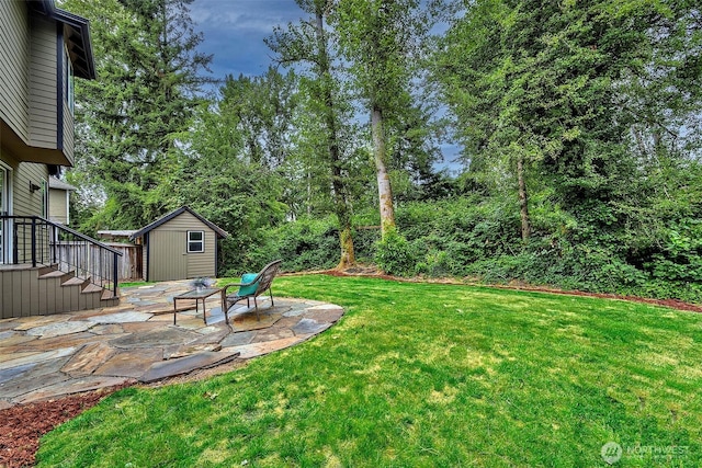 5044 157th Ct NE, Redmond, WA 98052 - view of grassy yard featuring a patio area and an outbuilding